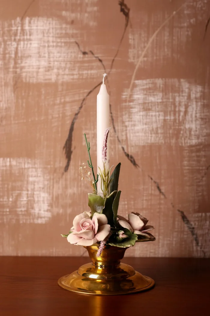 Flowers and brass candle stand