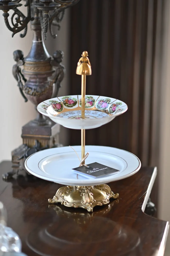 doll topped double tiered platter